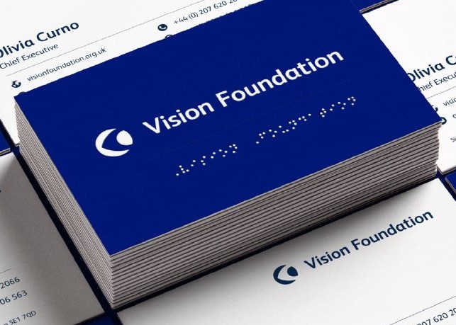 a stack of Vision Foundation business cards